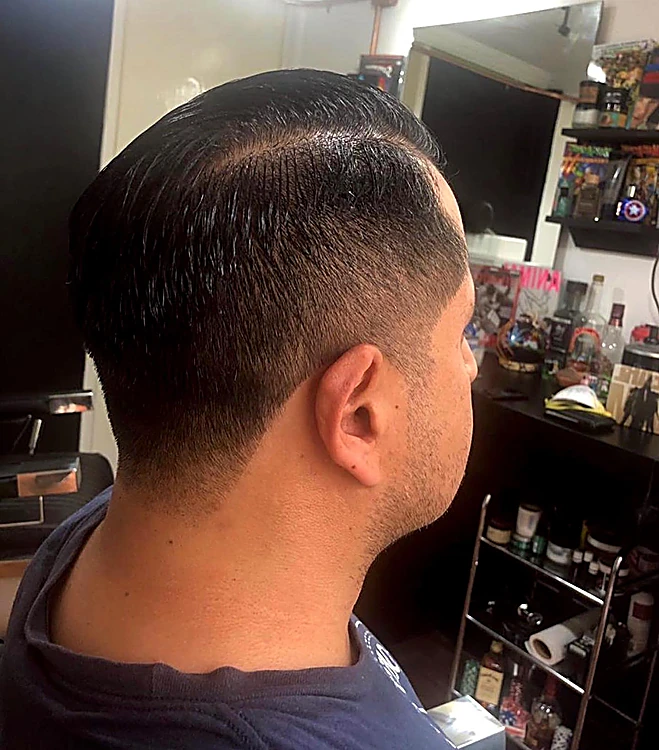 Corte terminado con degradado en la nuca.
